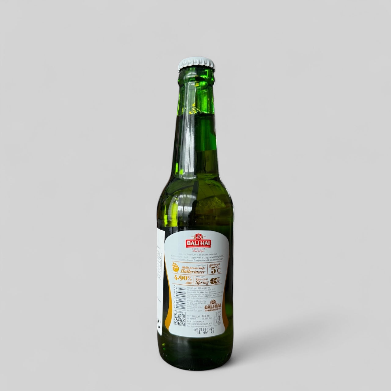 Vanka Kawat Bali Hai Premium Munich Lager, deutsches Bier, helles Lager mit goldener Farbe und schaumigem Kopf, Flasche im Bild