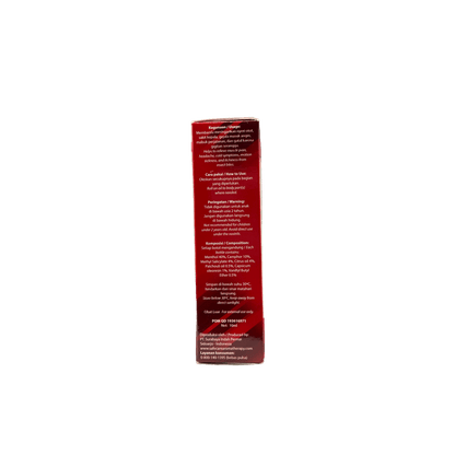 Nesia Food Safe Care Aroma Therapy Merah Massageöl in einer offenen Flasche mit ätherischen Ölen und entspannender Verpackung