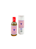 Nesia Food Tawon Massageöl EE, Massageöl mit natürlichen Inhaltsstoffen, Flasche mit gelb-grüner Beschriftung, Anwendung sichtbar